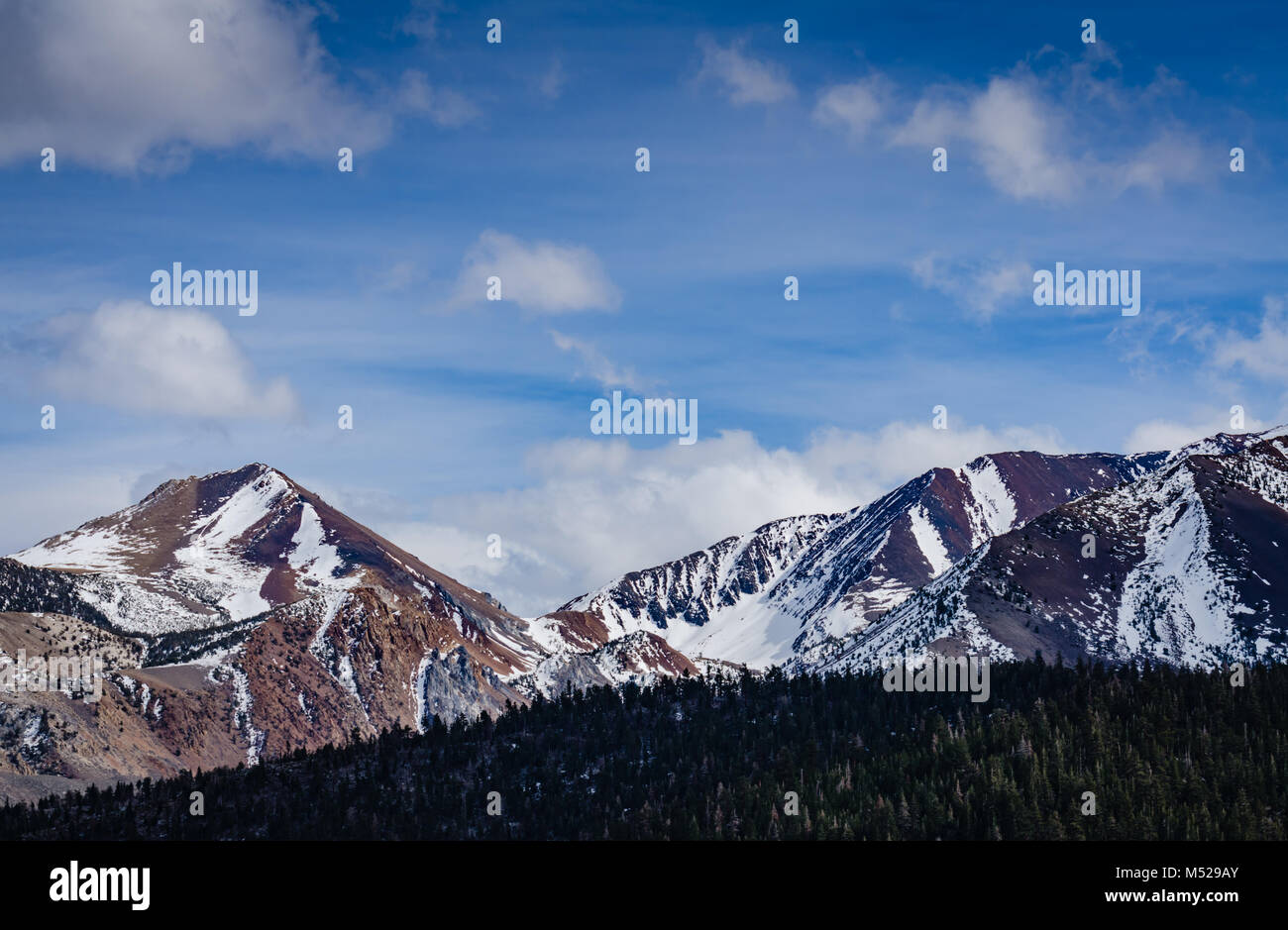Sierra Madre Mountains covered with snow seen from Mammoth, California. Stock Photo