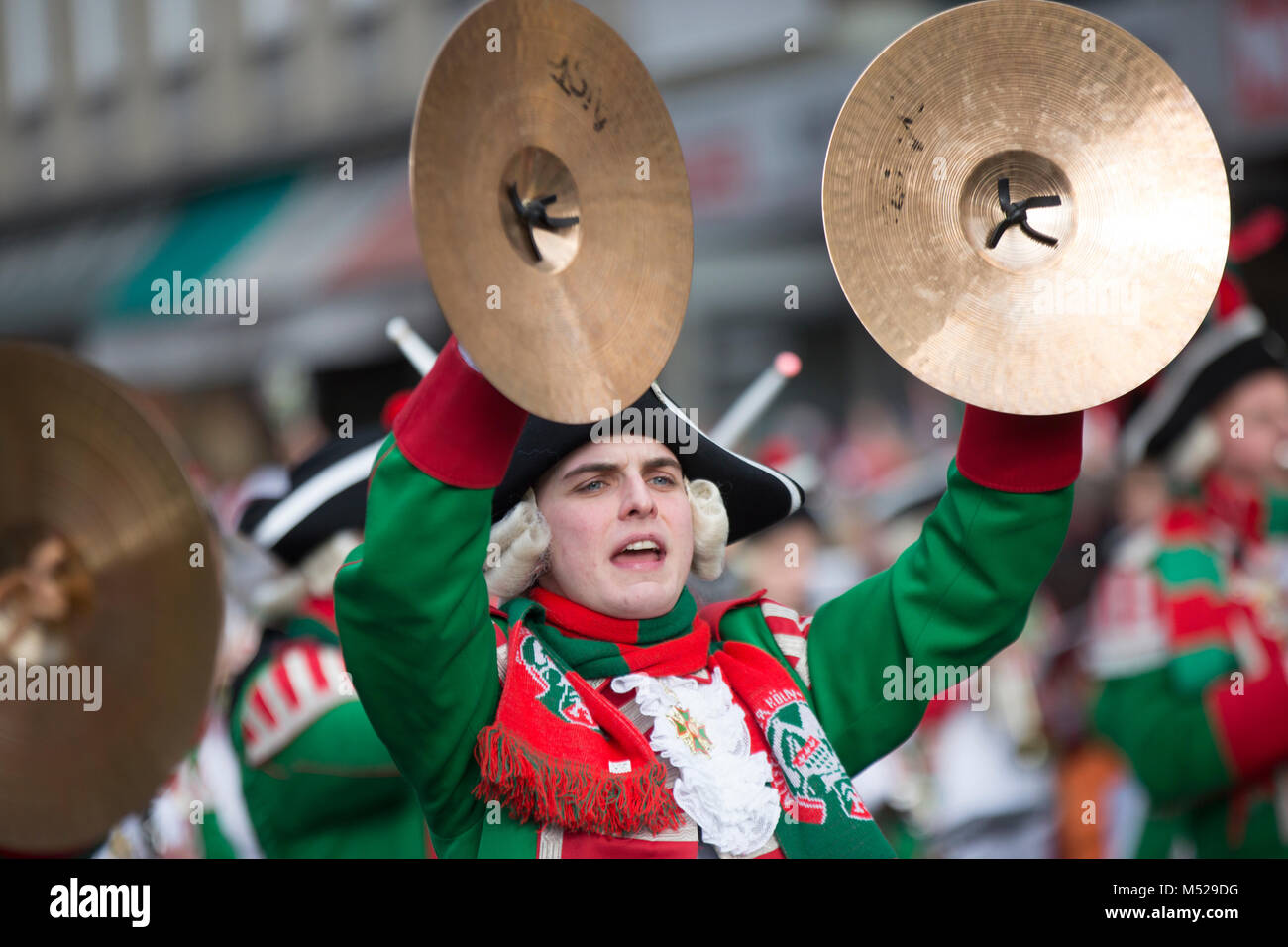 Musician of a brass band with cymbals in uniform,Carnival Monday procession,Cologne,North Rhine-Westphalia,Germany Stock Photo
