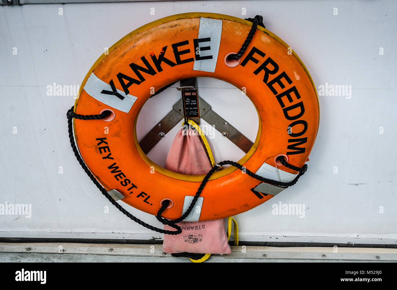 Emergency safety throw ring on the Yankee Freedom Ferry carrying passengers between Key West, Florida and Dry Tortugas National Park. Stock Photo