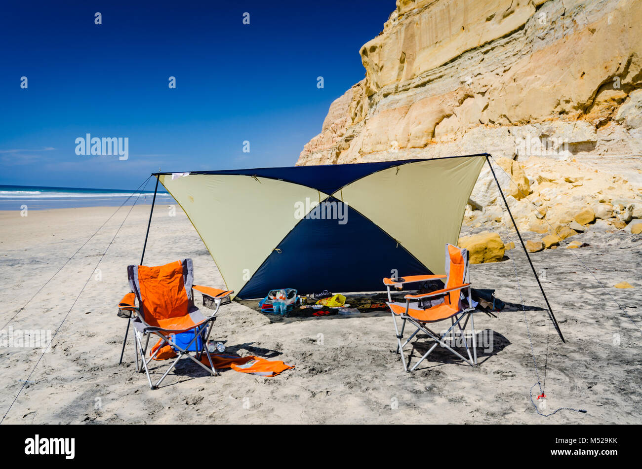 Tent shelters picnic on the beach at Torrey Pines State Natural Preserve near San Diego, California. Stock Photo