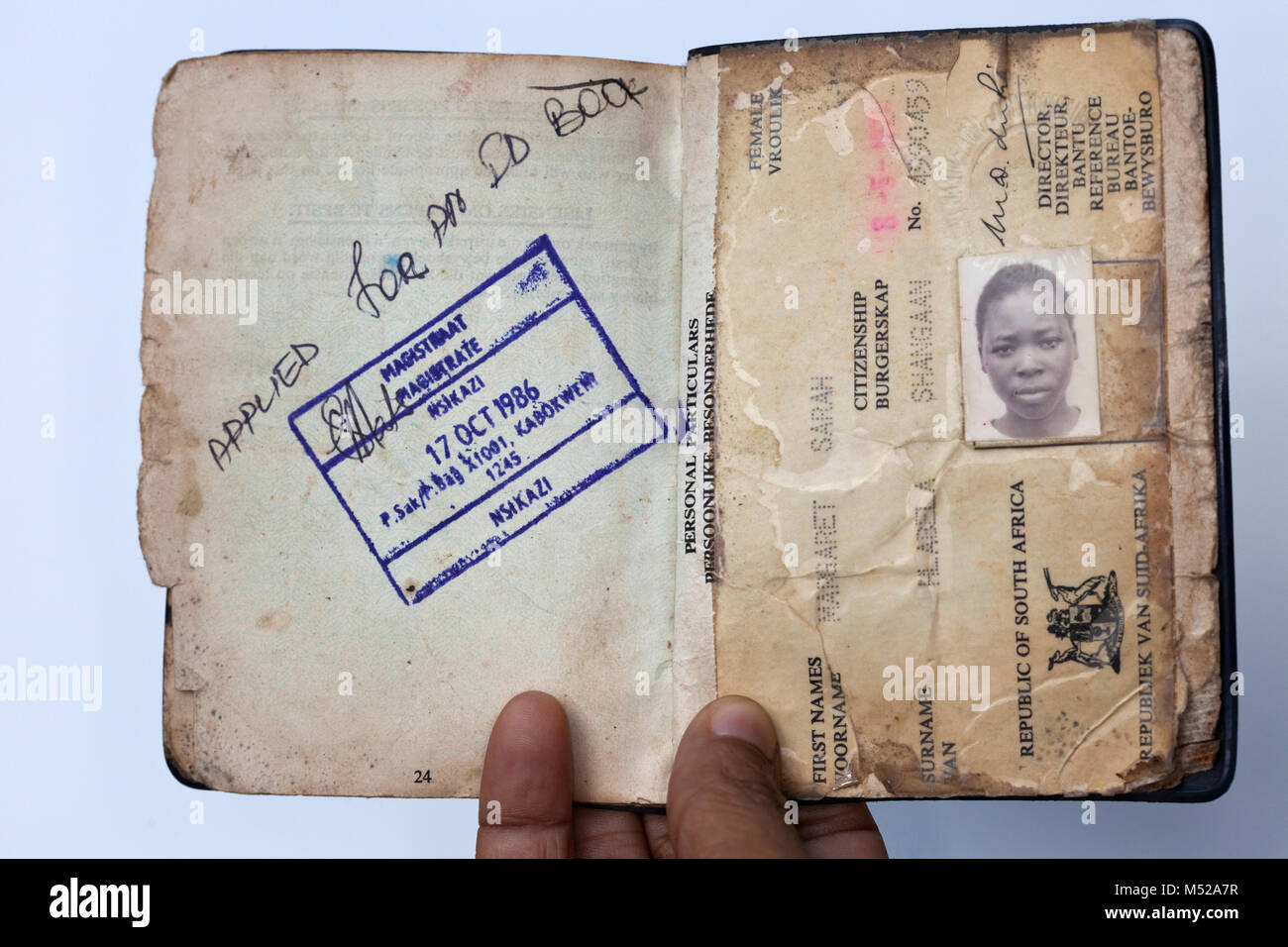Apartheid-era South African ID or reference book (dompas) -  Pass Laws Act, made it compulsory for all black South Africans over the age of 16 to carr Stock Photo