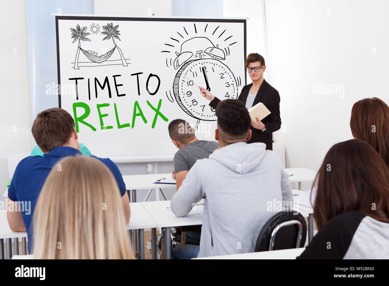 Teacher Giving Time To Relax Lecture Students Stock Photo