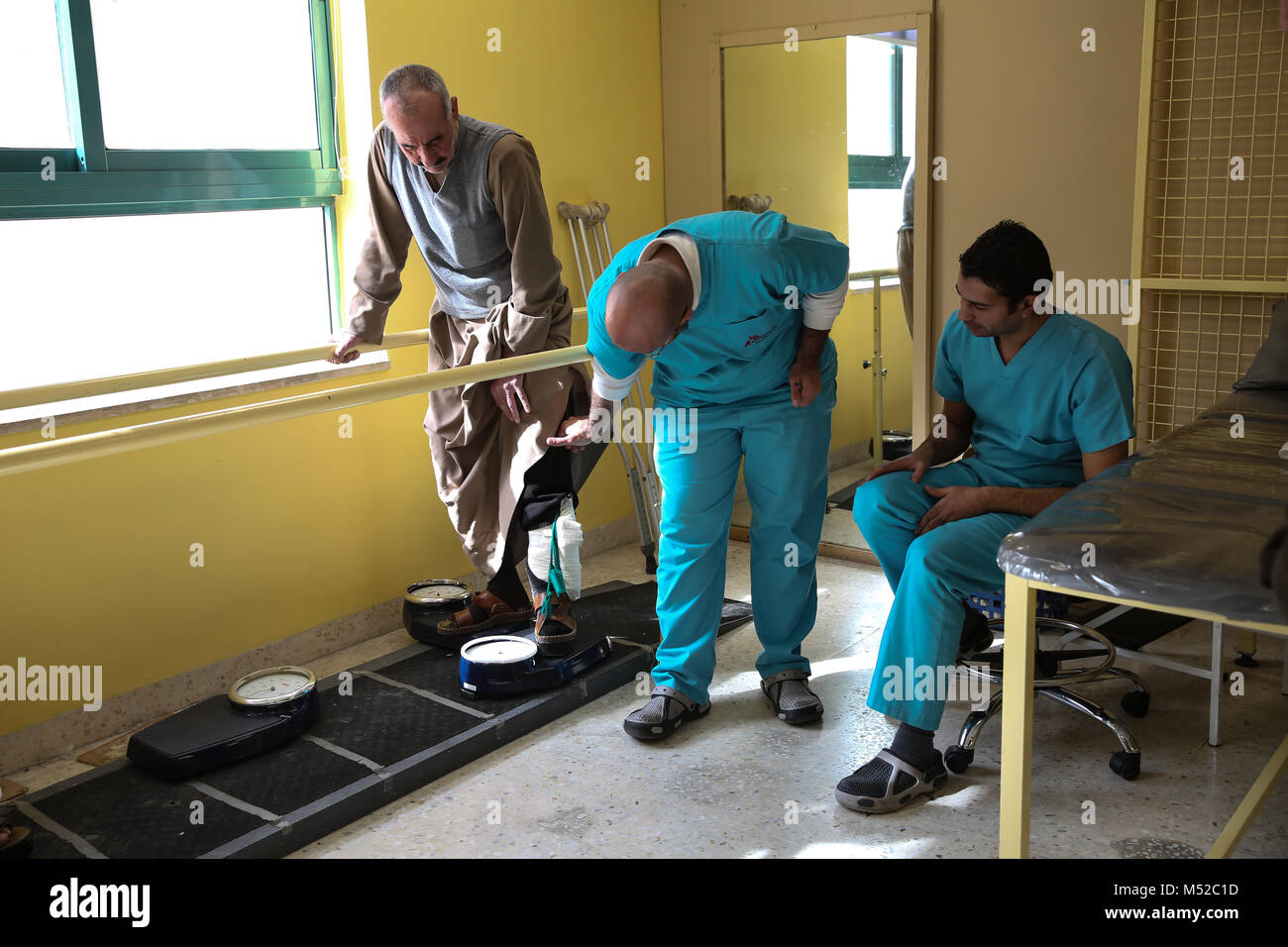 A man goes through physiotherapy exercises at the MSF reconstructive  surgery hospital in Amman, Jordan - the only hospital of its kind for  weapon-wounded in the Middle East. There are currently over