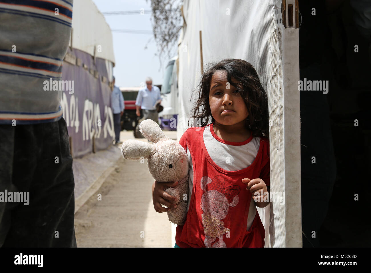 Child refugee stuffed hi-res stock photography and images - Alamy