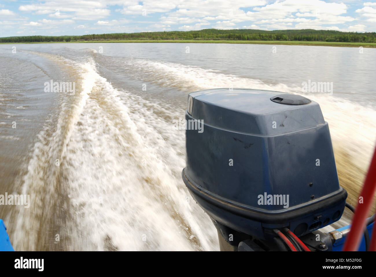 outboard motor boat on the river Stock Photo Alamy