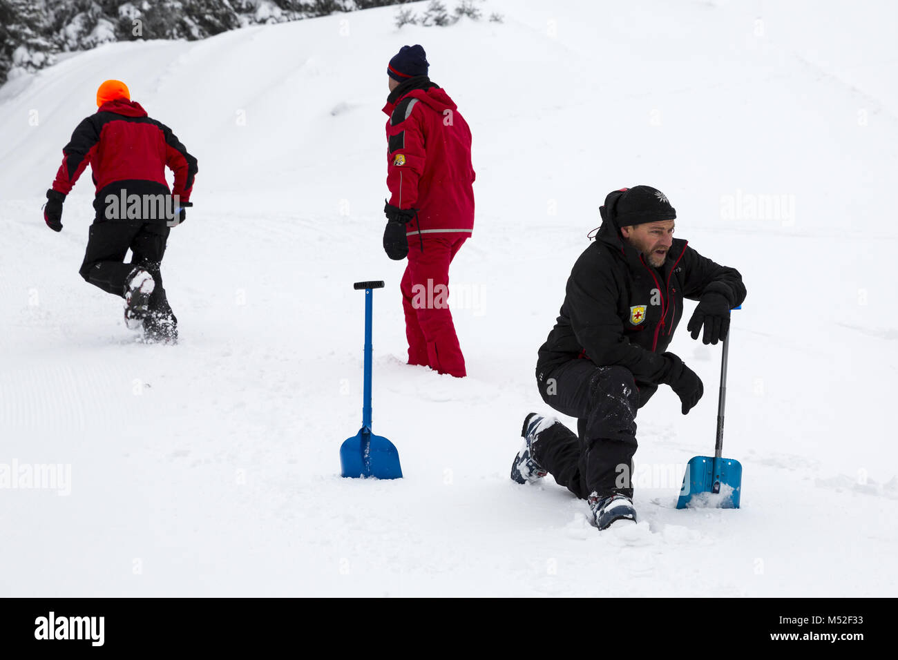 Red cross rescuers shovels hi-res stock photography and images - Alamy