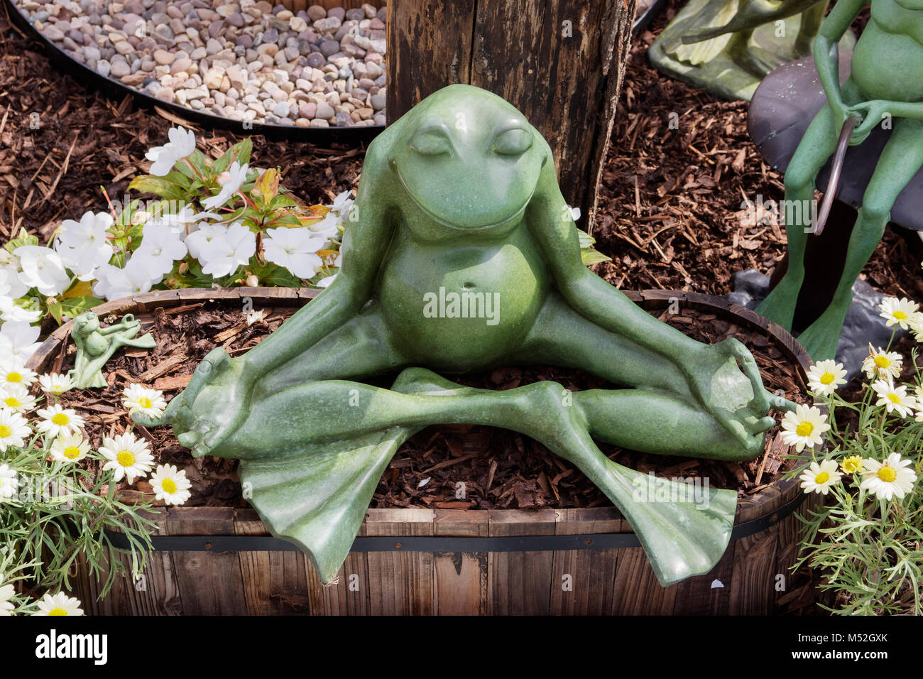 Frog statue meditating Stock Photo Alamy