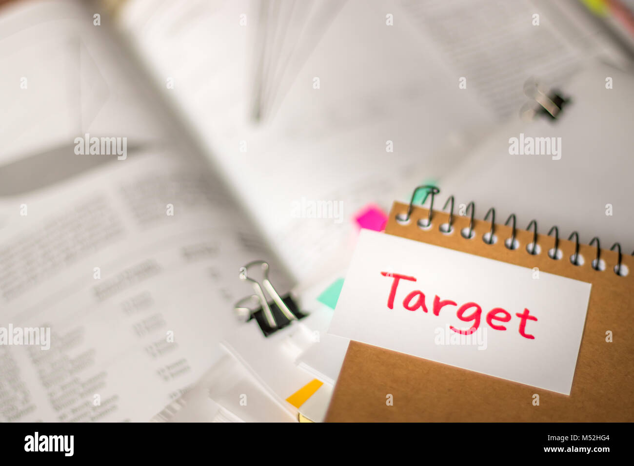 Target; Stack of Documents with Large Amount of Analytic Material. Stock Photo