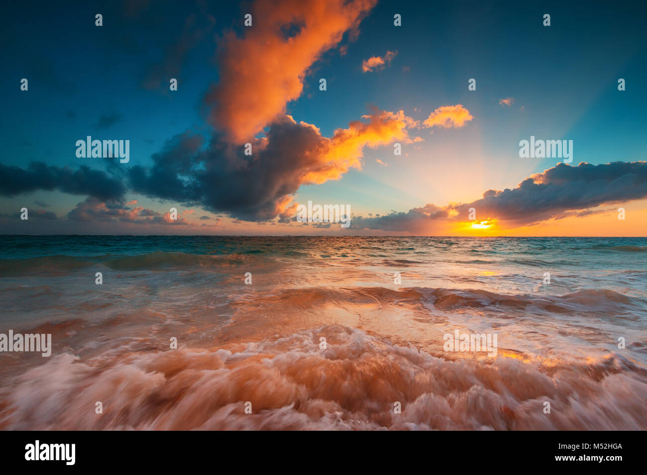 Beautiful cloudscape over the sea, sunrise shot Stock Photo - Alamy