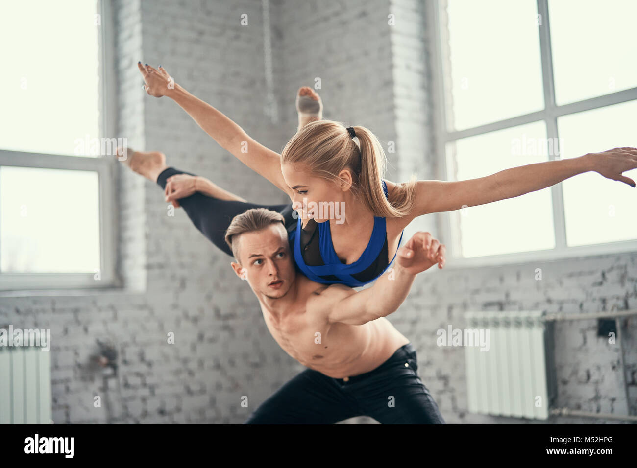 Complex Dancing A young couple of dancers perform complex tricks Stock Photo - Alamy
