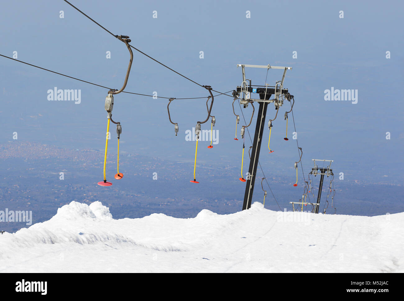 Alpine ski lift at Etna ski resort. Sicily, Italy. Stock Photo