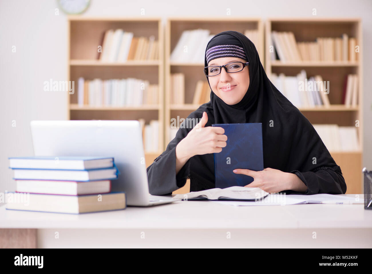 Muslim girl in hijab studying preparing for exams Stock Photo - Alamy