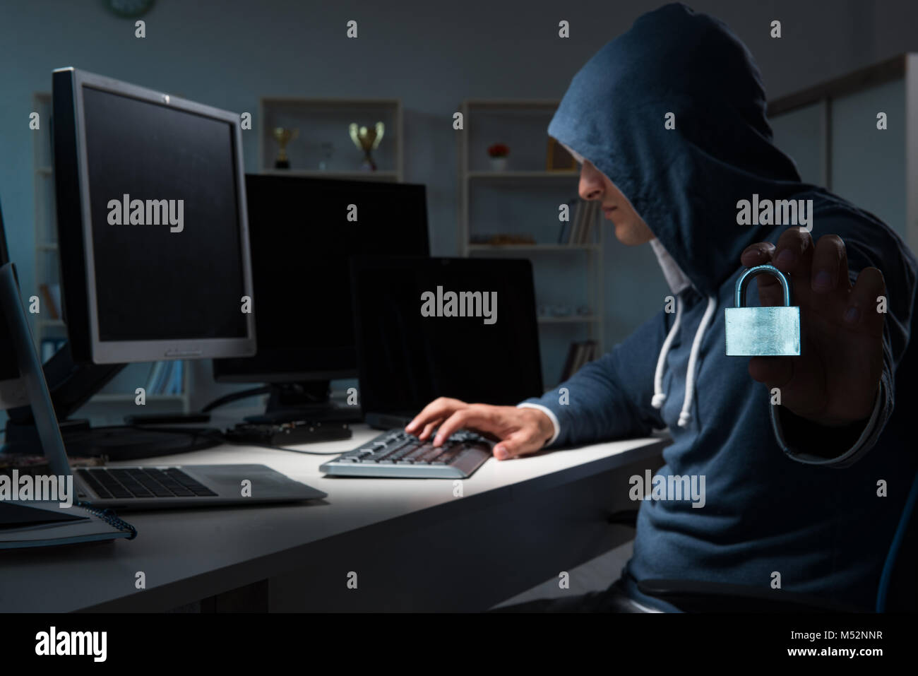 Hacker Switching Off A Computer Hacker hacking computer at night Stock Photo - Alamy