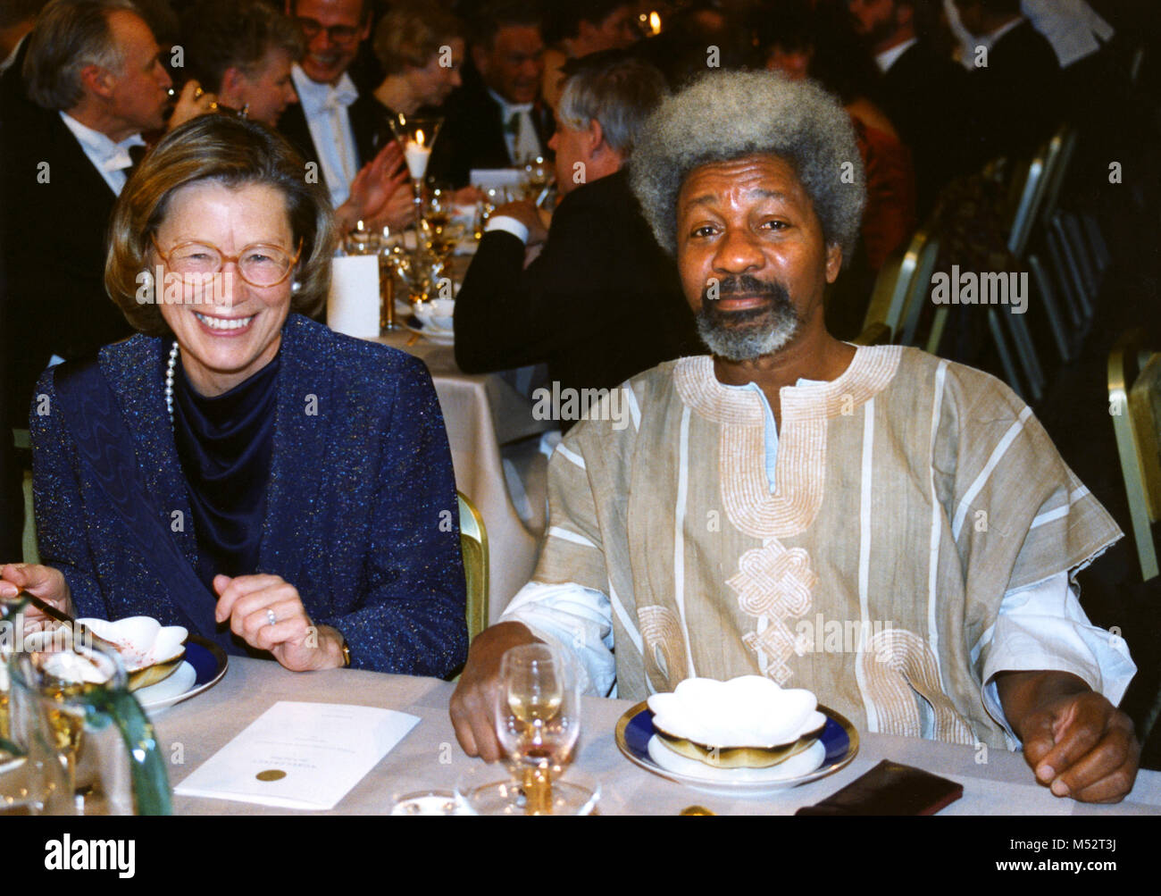 WOLE SOYINKA Nigerian author and Nobel Laureate in Literature 1986 at Nobel banquet with Swedens minister of Foraign affairs Margaretha af Ugglas Stock Photo