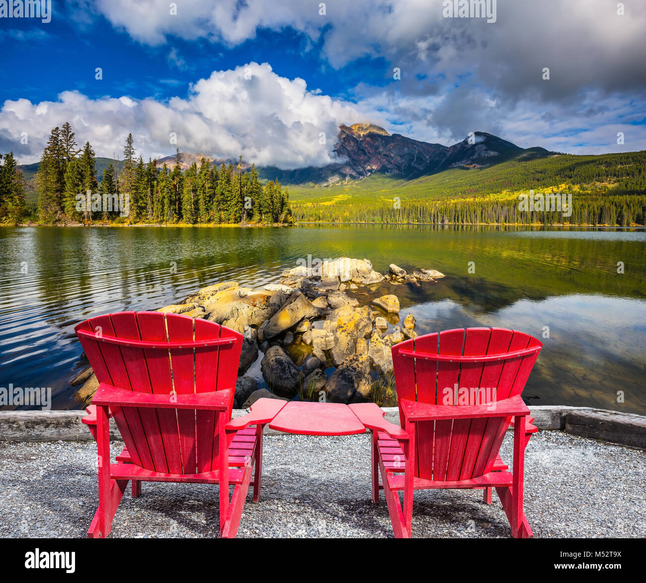 Two red chaise lounges for the tourists Stock Photo