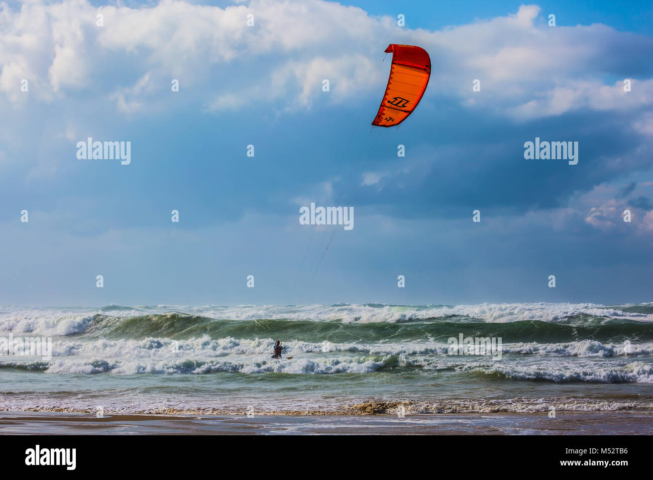 Kitesurfer ride the big  surf Stock Photo