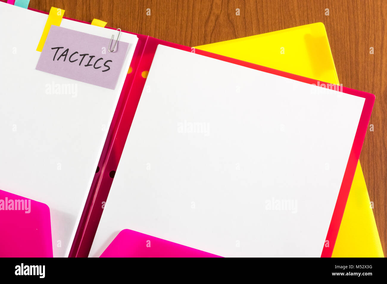 Tactics; White Blank Documents with Small Message Card. Stock Photo