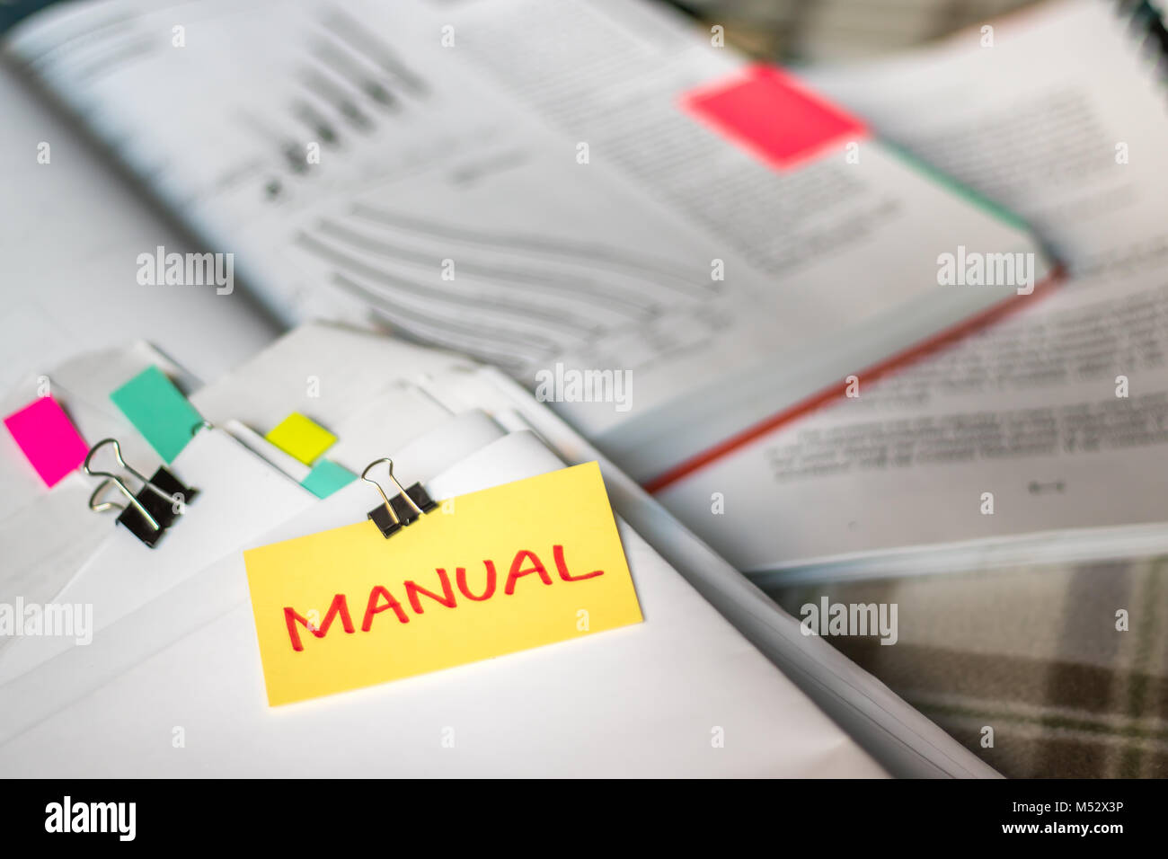 Manual; Stack of Documents with Large Amount of Analytic Material. Stock Photo