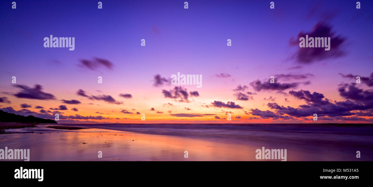 Panoramic picture of a sunset over the Baltic sea Stock Photo - Alamy