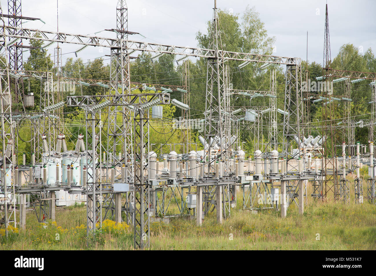 Electrical substation poles and wires summer day Stock Photo