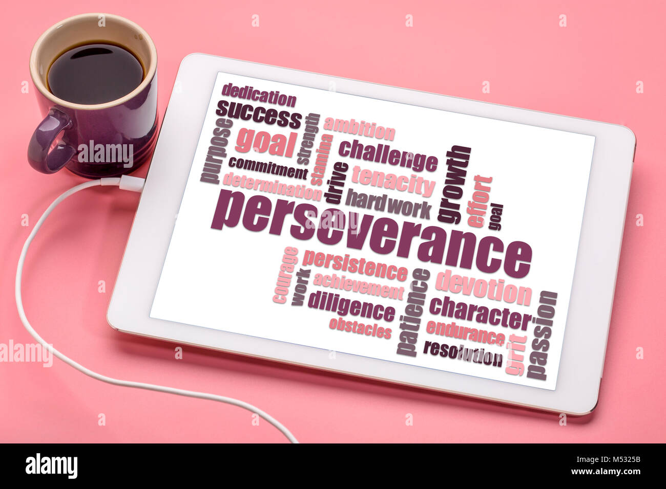 perseverance word cloud  on a digital tablet with a cup of coffee Stock Photo