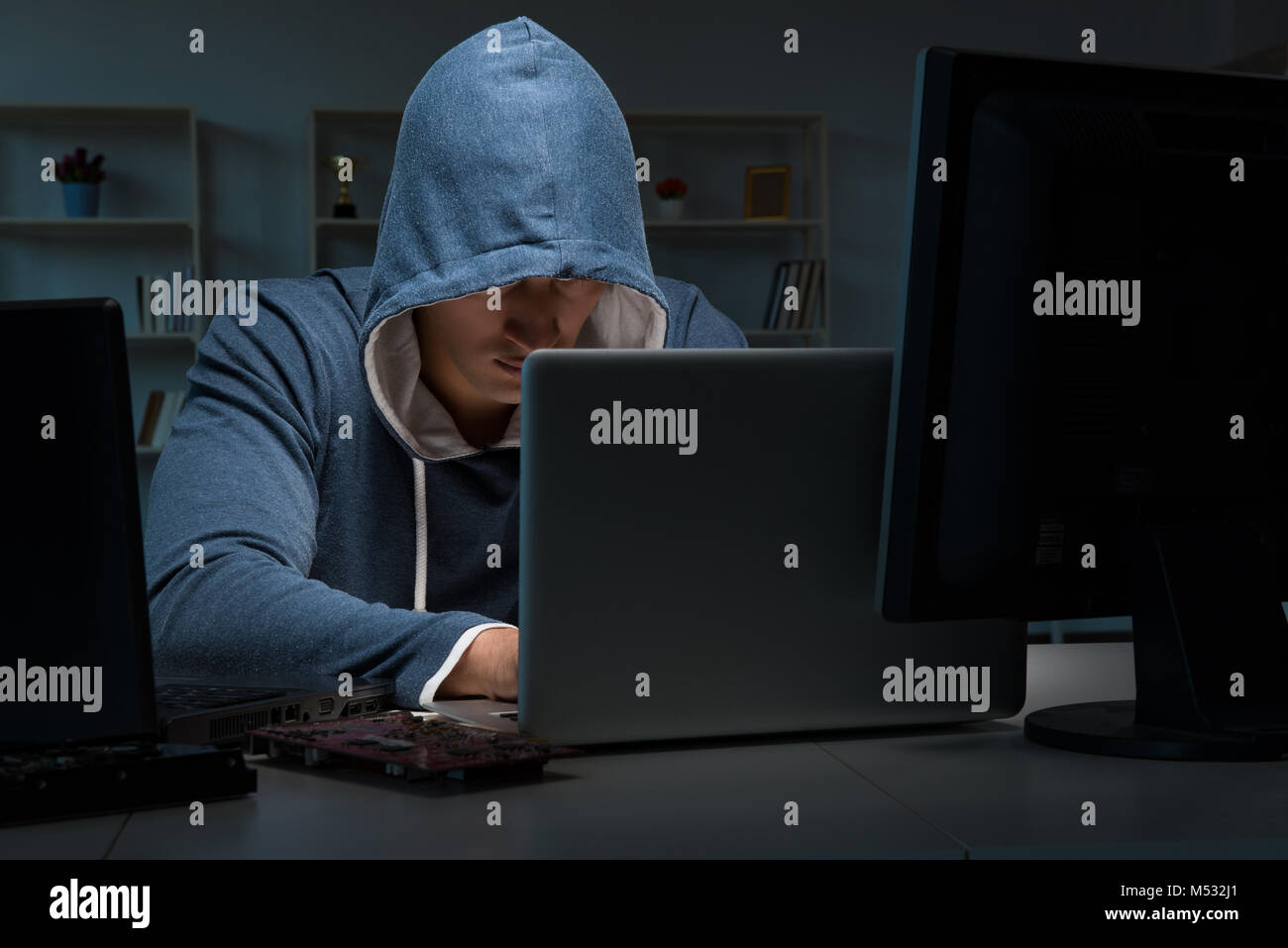 Hacker hacking computer at night Stock Photo - Alamy