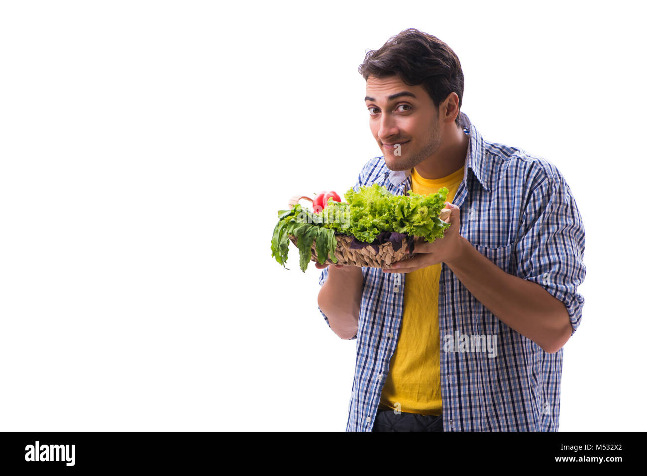 Man with basket of fruits and vegetables Stock Photo - Alamy