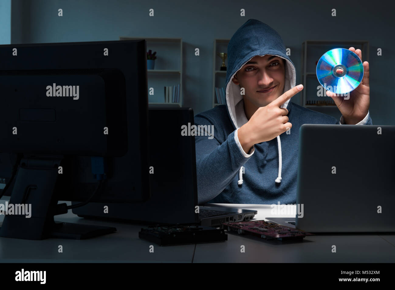 Hacker hacking computer at night Stock Photo - Alamy