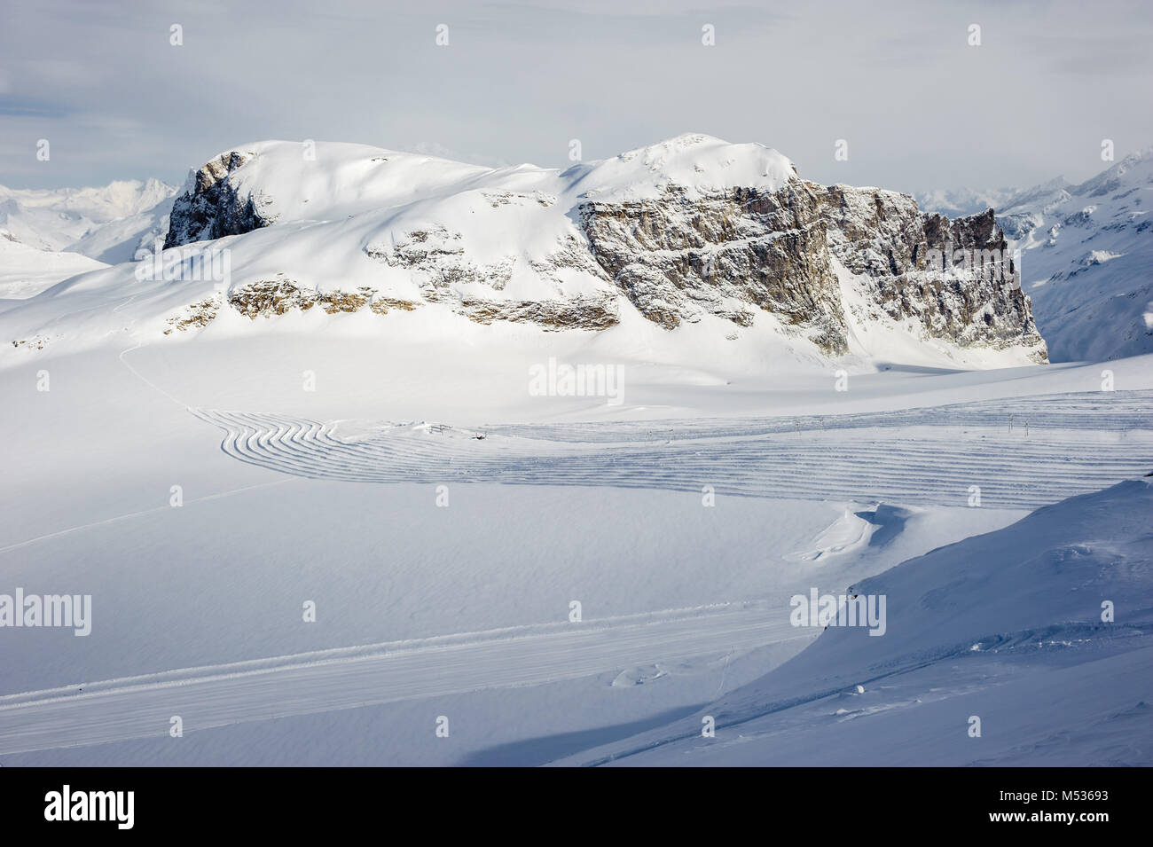 Alpine winter mountain landscape. French Alps with snow Stock Photo - Alamy
