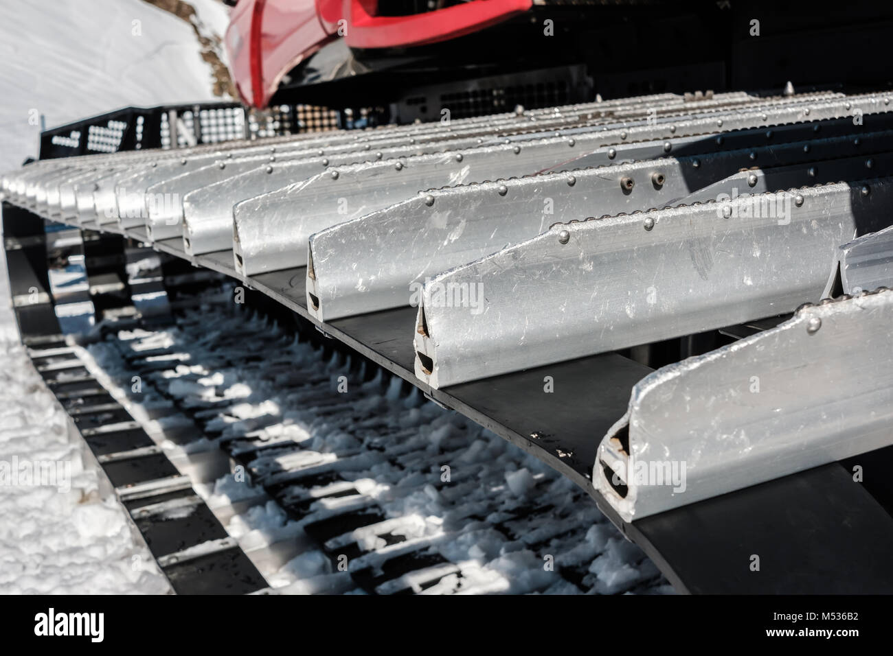 Snow grooming machine (Ratrak). Winter mountain landscape Stock Photo
