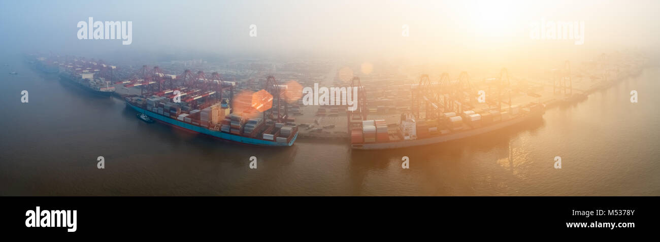 container terminal in morning fog Stock Photo