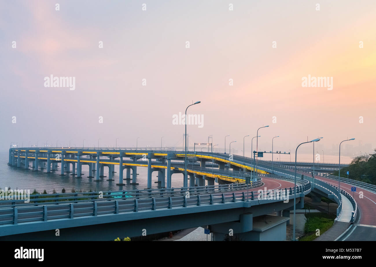 dalian bay bridge in sunset Stock Photo