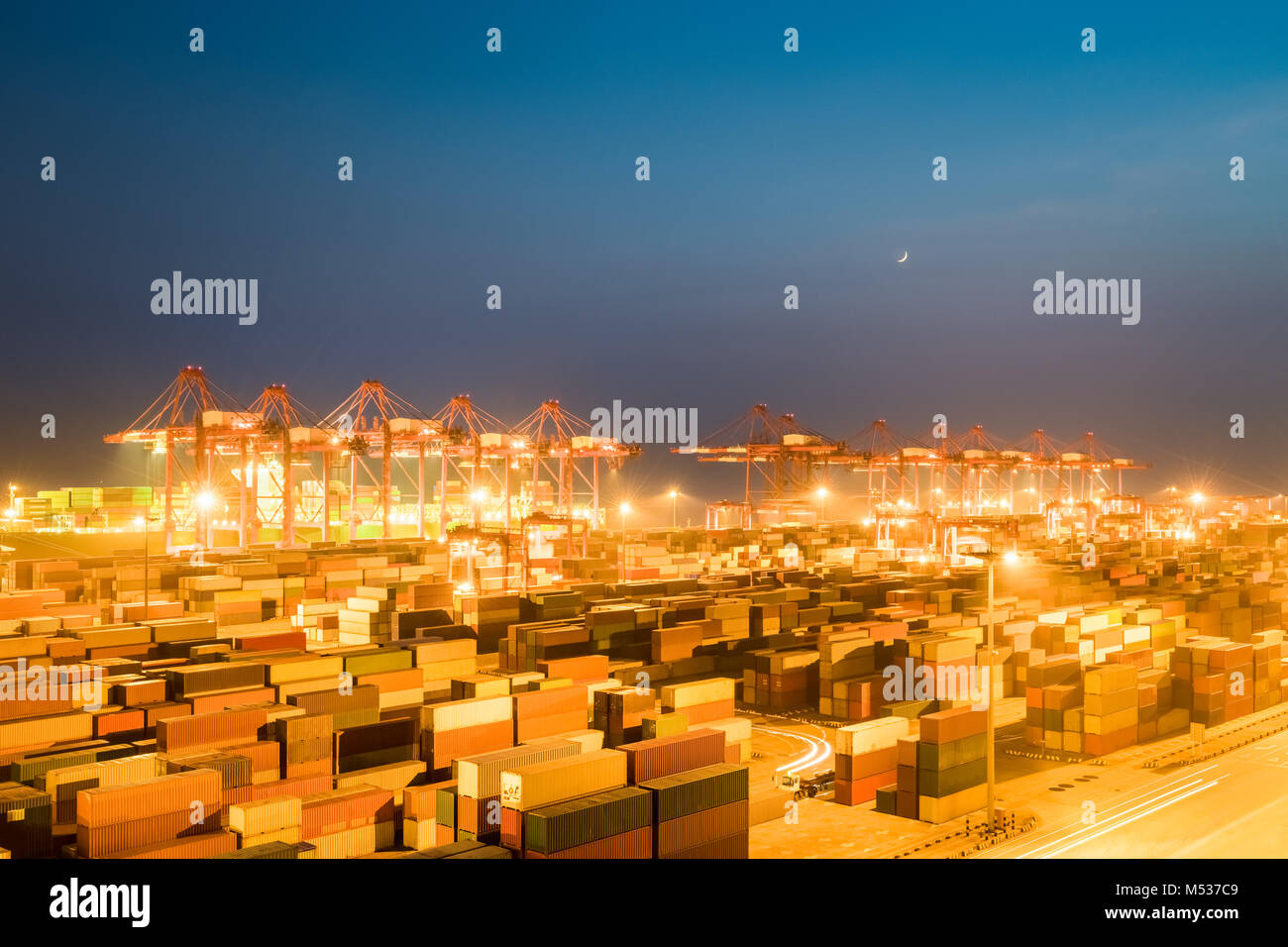 shipping container terminal at night Stock Photo