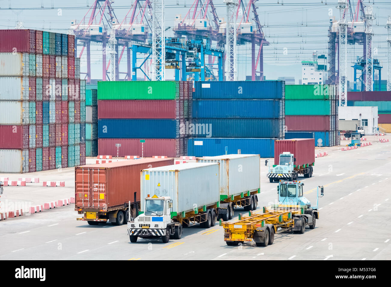 busy container port closeup Stock Photo