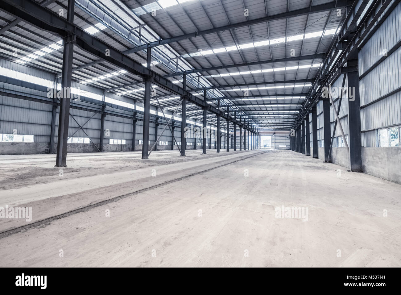empty steel structure warehouse Stock Photo