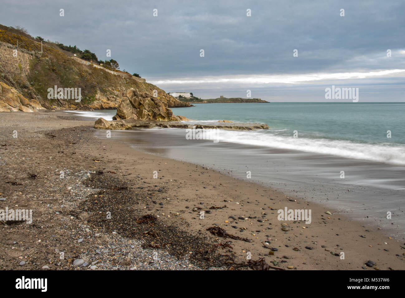 White Rock, Killiney, with a view of Sorrento Terrace and Dalkey Island. Stock Photo