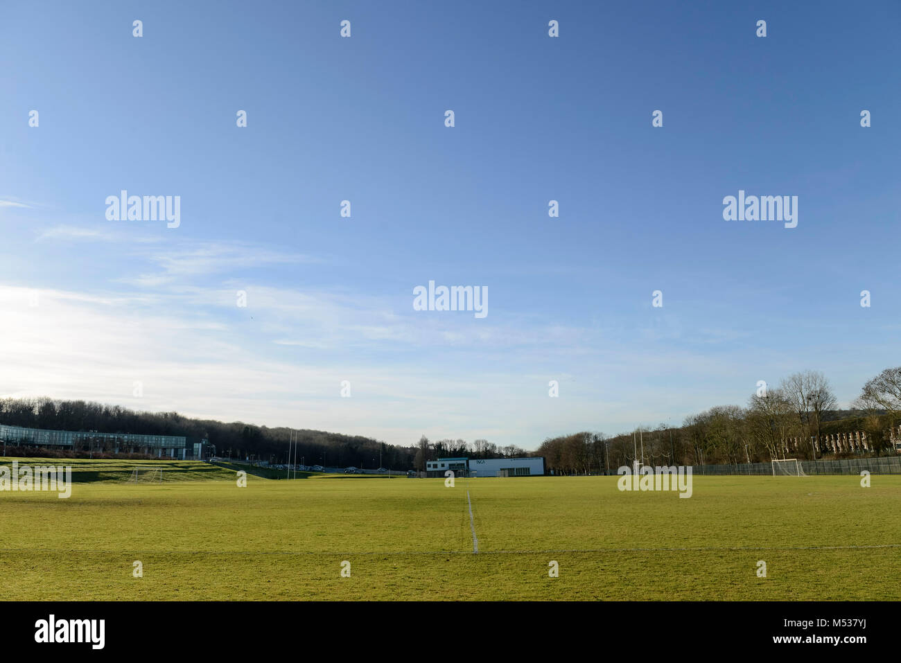 school sports grounds and pitches marked out for sports such as football and rugby with neatly cut grass Stock Photo