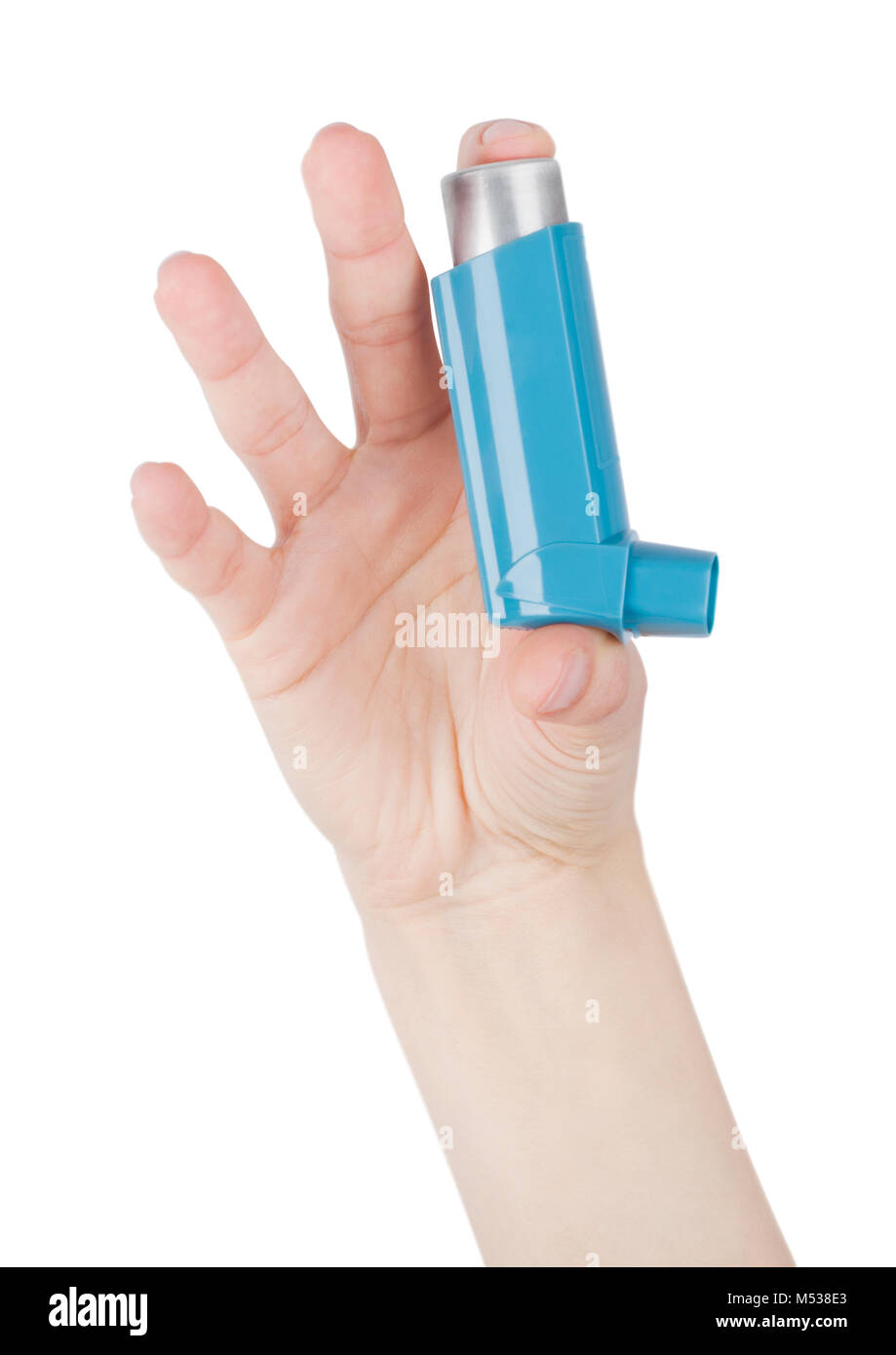 Female hand holds blue asthma inhaler for relief asthma attack on white