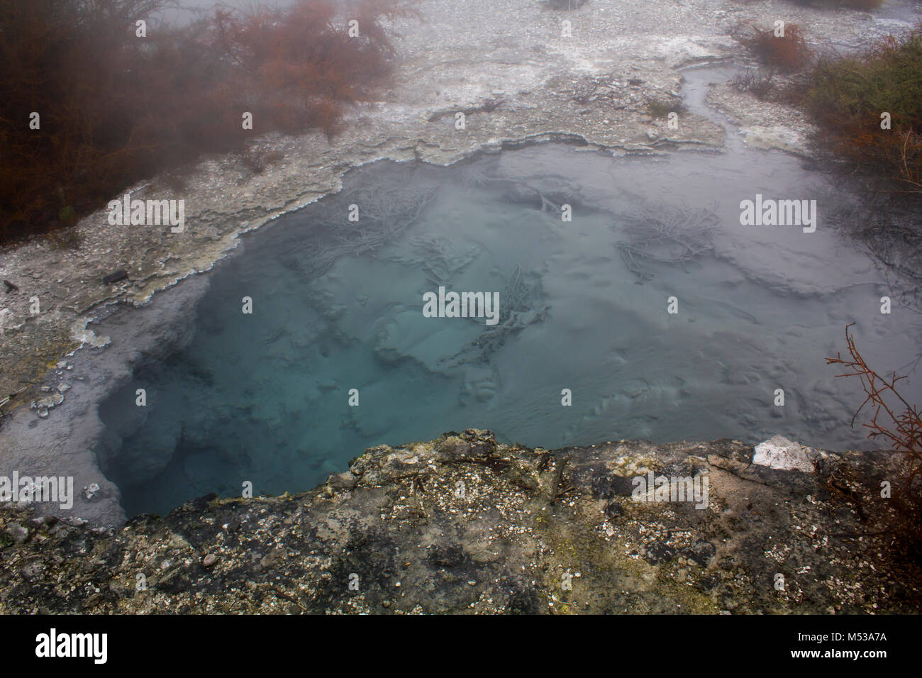 Thermal Blue Lake With Steam Stock Photo