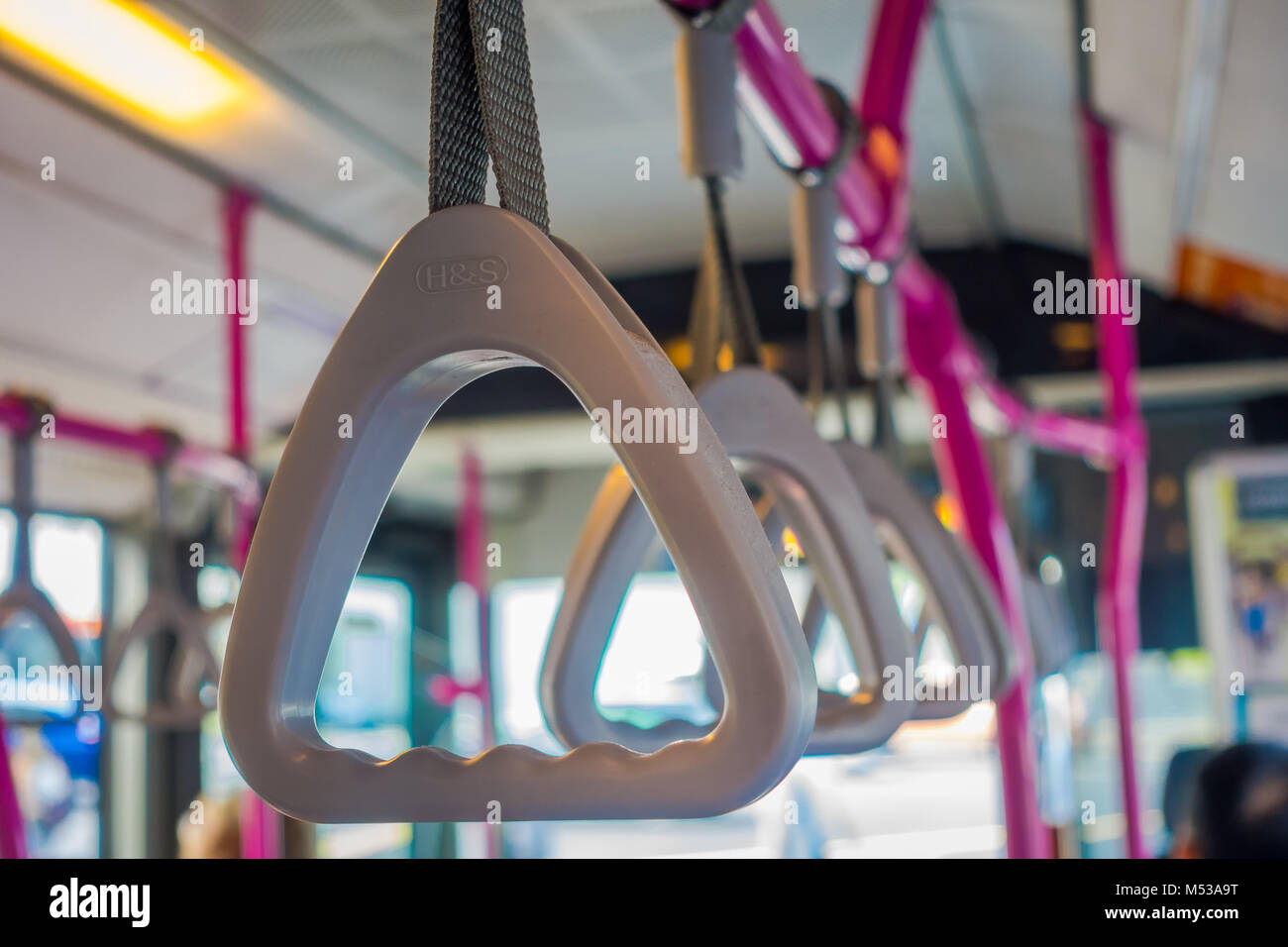 Bus handle for passenger inside public bus Stock Photo Alamy