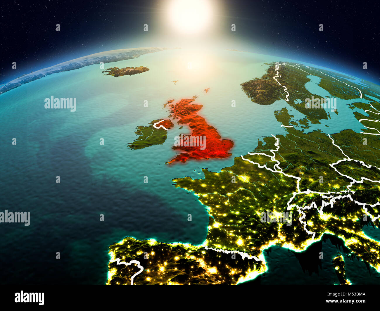 Sunrise above United Kingdom highlighted in red on model of planet ...