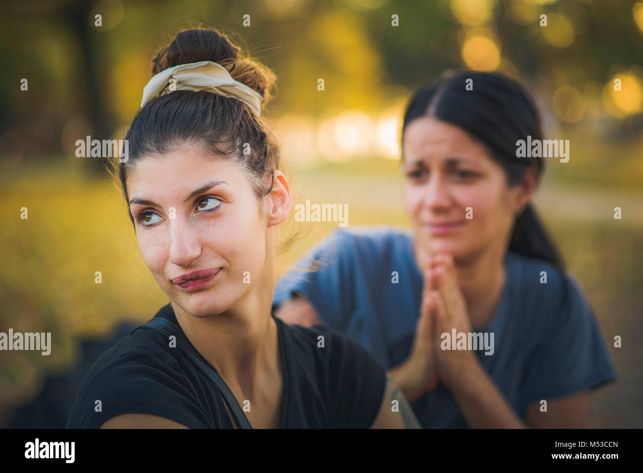 Two women having a relationship issue Stock Photo