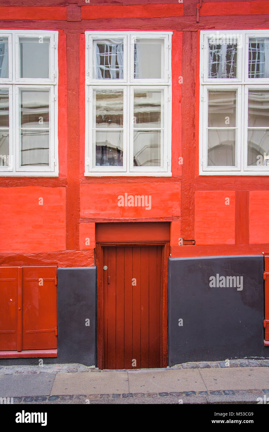 Bright red wall, door and window Stock Photo