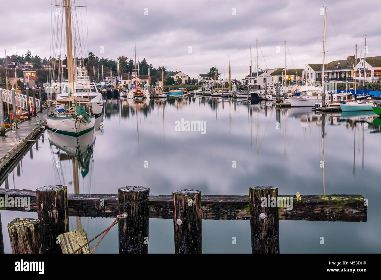 Boats of all types moored in the harbor at dawn.  Port Townsend, Washington Stock Photo