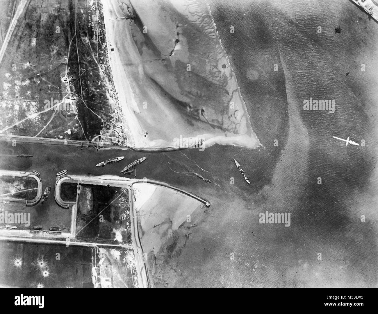 Aerial photograph showing aftermath of the Zeebrugge Raid. British blockships are, left - right : HMS Intrepid, HMS Iphigenia, HMS Thetis. April 1918 Stock Photo