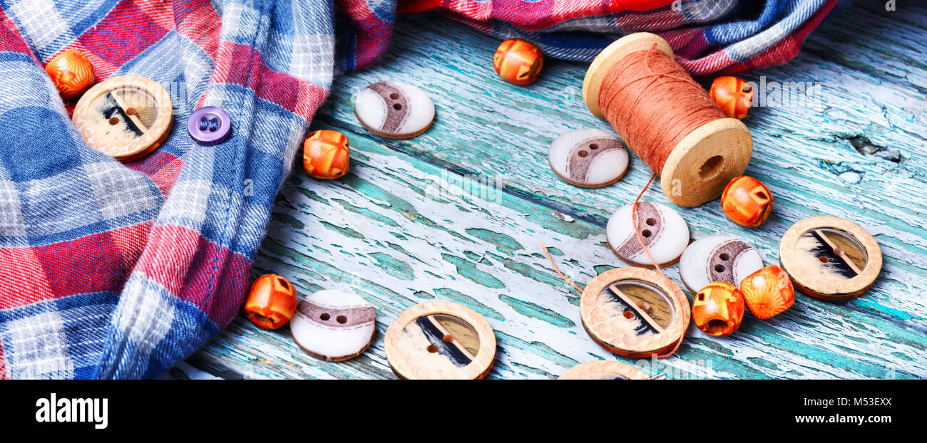 sewing kit from sewing thread, buttons and fabric Stock Photo - Alamy