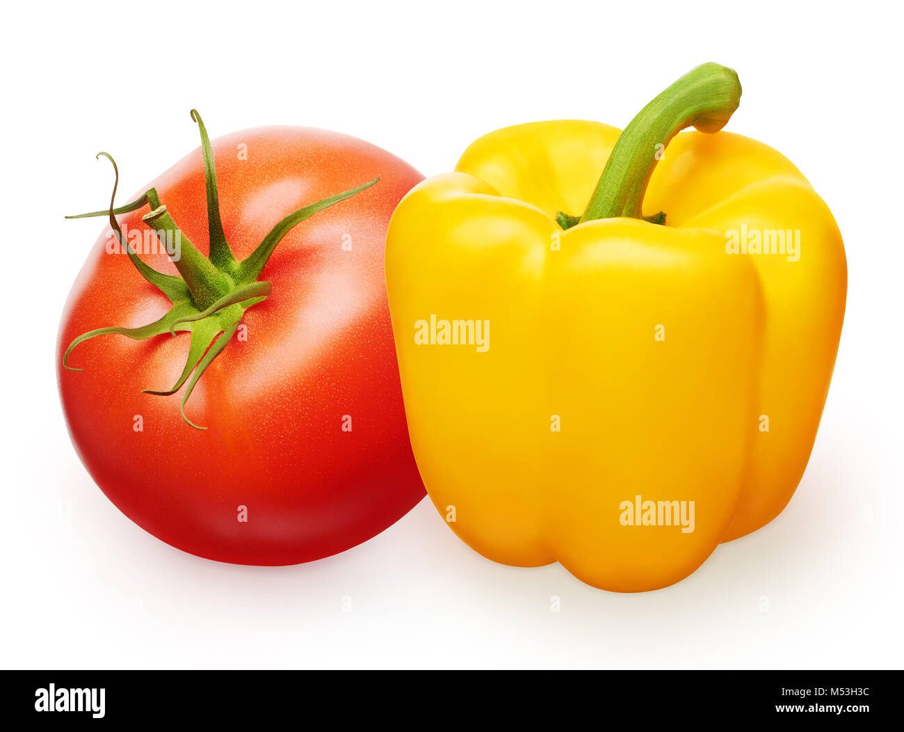 Whole fresh red tomato with green leaf and yellow bell pepper ...
