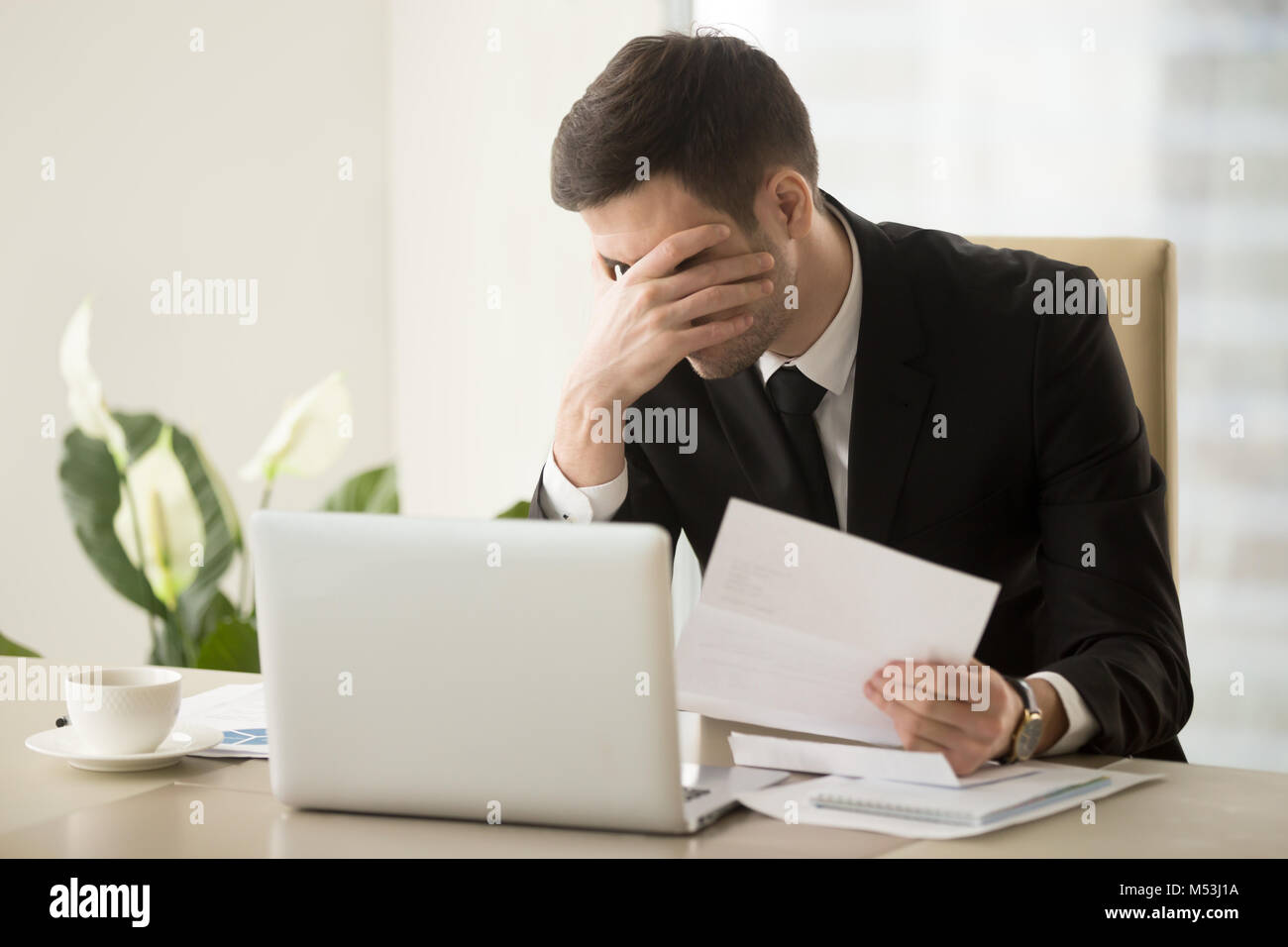 CEO shocked because refusal to renew work contract Stock Photo