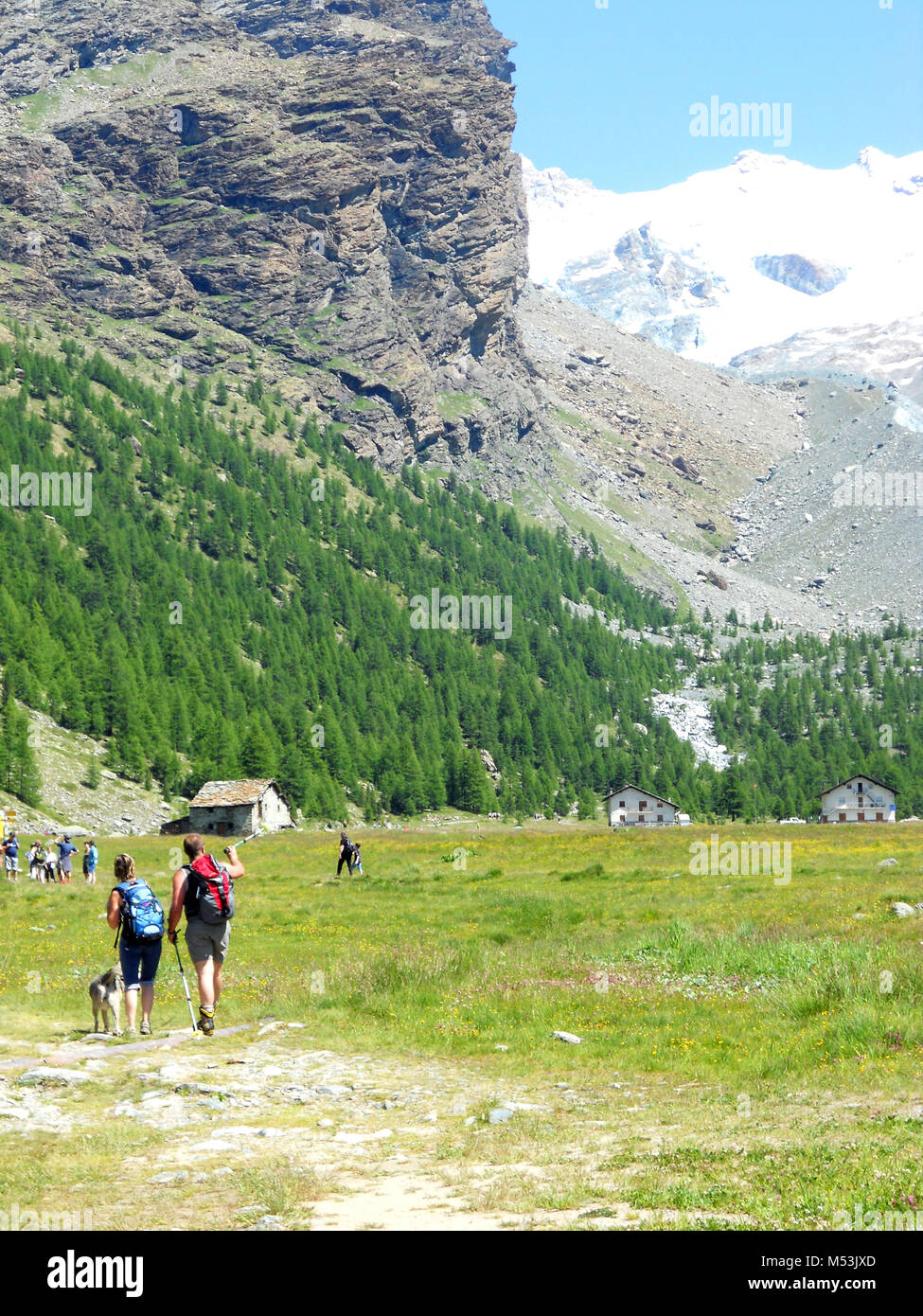 Family hiking in alps hi-res stock photography and images - Alamy