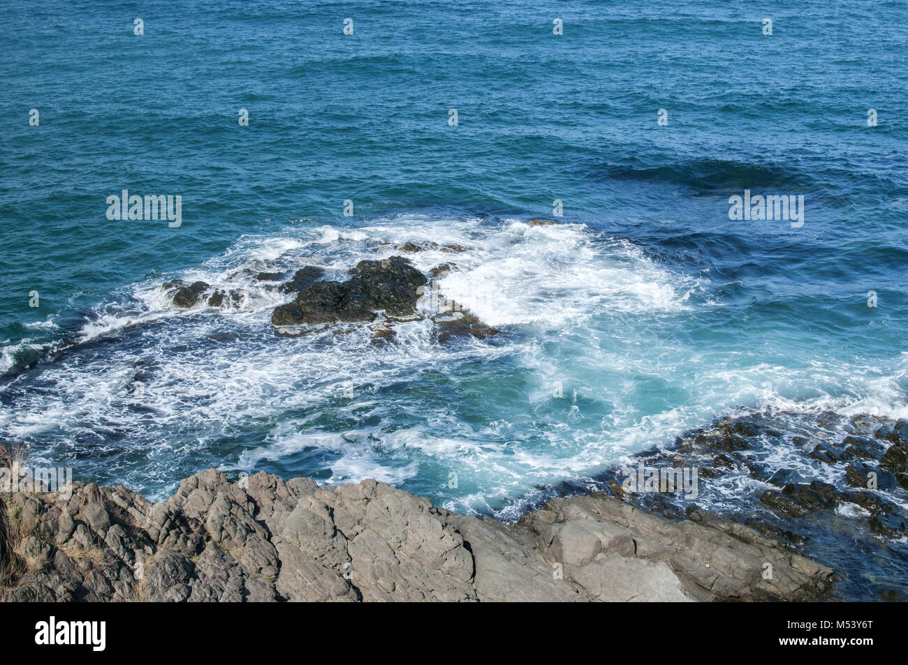 Rocky seashore view Stock Photo - Alamy